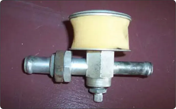 Vacuum regulator or suction relief valve with foam filter for controlling vacuum and protecting the aircraft vacuum pump
