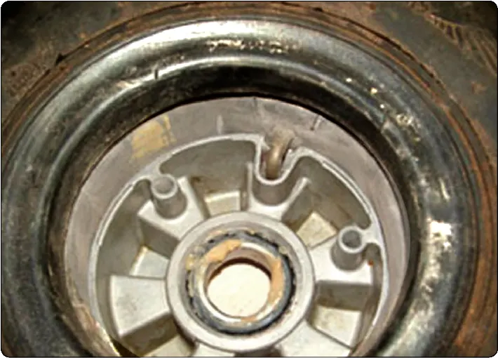 Tube-type aircraft tire being mounted with the tube valve stem aligned through the outboard wheel half