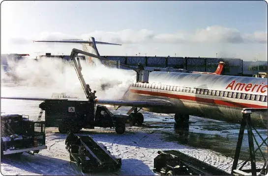 Aircraft being deiced on the ground at airport