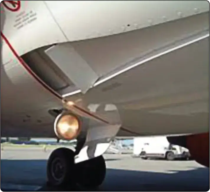 Ram air door assembly used to regulate airflow through the primary and secondary heat exchangers