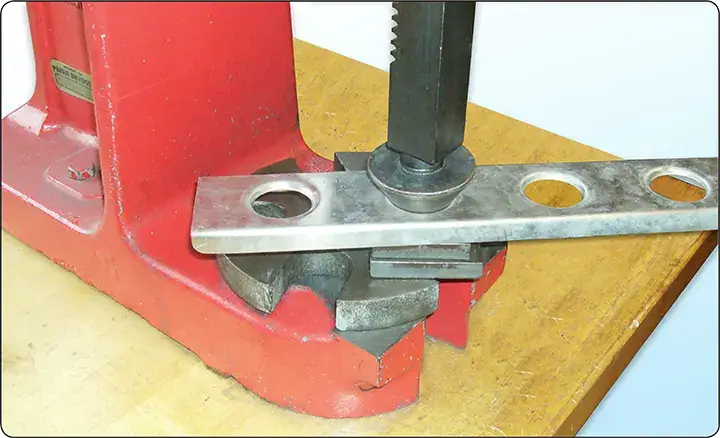 Lightening hole die set used to form reinforced lightening holes in aircraft sheet metal