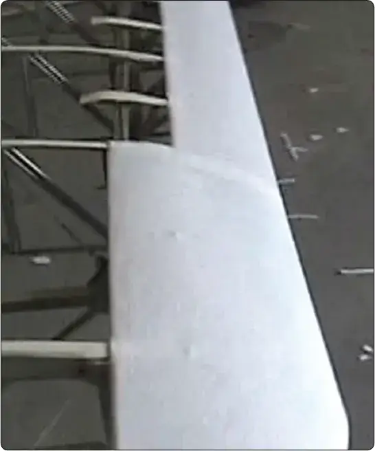 Specified felt or padding applied over a wing leading edge to create a smooth surface before fabric installation
