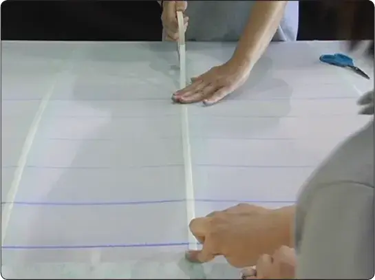 Reinforcing tape applied over aircraft wing ribs to strengthen the fabric covering