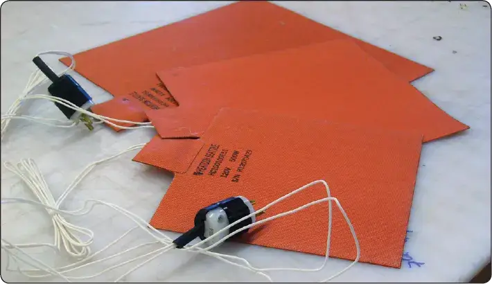Heat blankets used to provide controlled heating during aircraft composite repair and curing