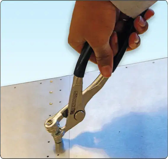 Cleco fasteners and Cleco pliers used to temporarily hold aircraft sheet metal parts together
