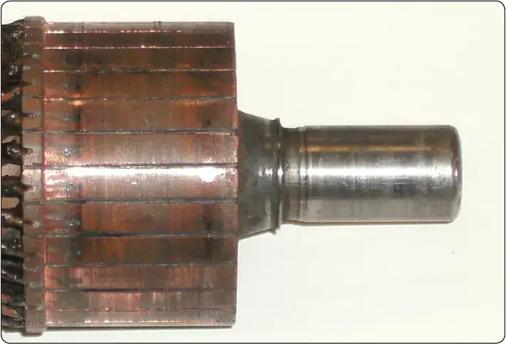 Typical DC generator commutator with segmented copper bars for producing direct current output