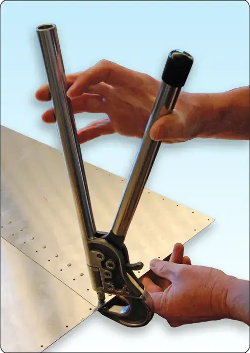 Hand squeezers used to install solid shank rivets in aircraft sheet metal