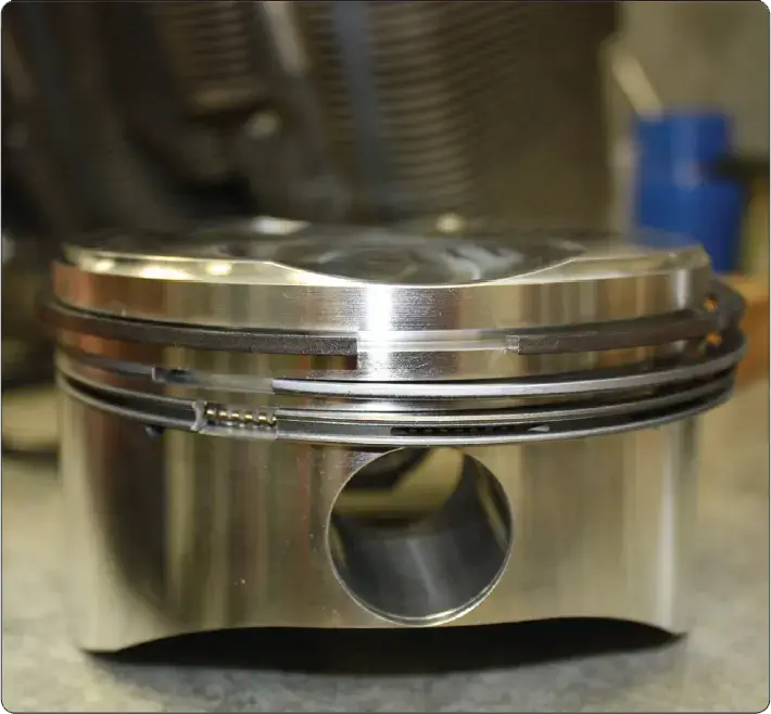 Aircraft reciprocating engine piston machined rings