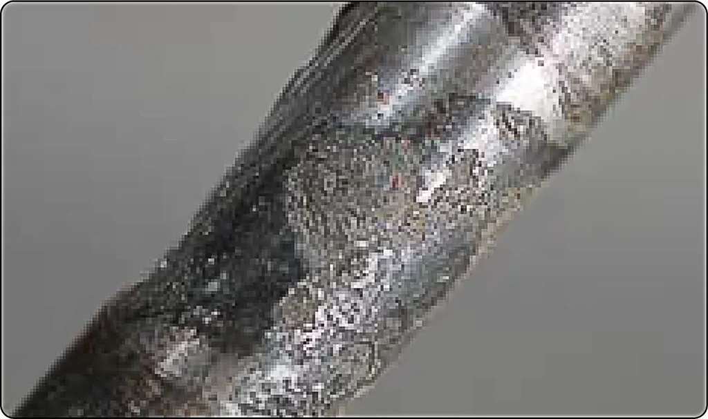 Illustration showing corrosion at the contact area between dissimilar metals, where galvanic action can cause accelerated deterioration of the less noble metal