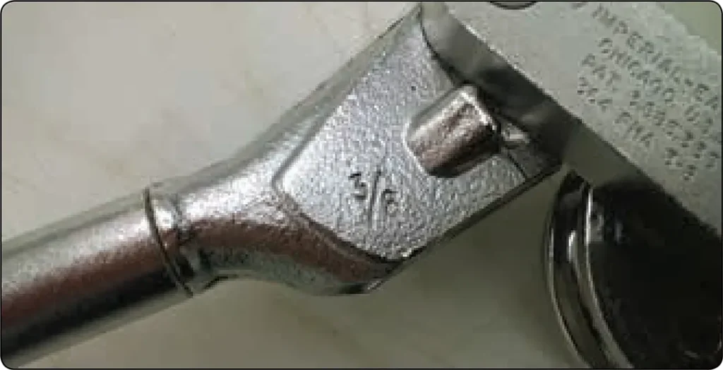 Hand tube bender with tubing size markings stamped on the tool to help select the correct size for bending aircraft rigid fluid lines