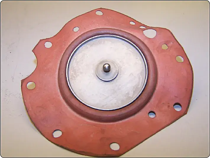 Fuel diaphragm assembly with an attached ball valve used for controlling fuel flow in an aircraft fuel-injection system