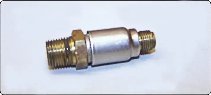 Aircraft fuel-injection nozzle assembly showing the components used to deliver metered fuel into the engine intake or cylinder