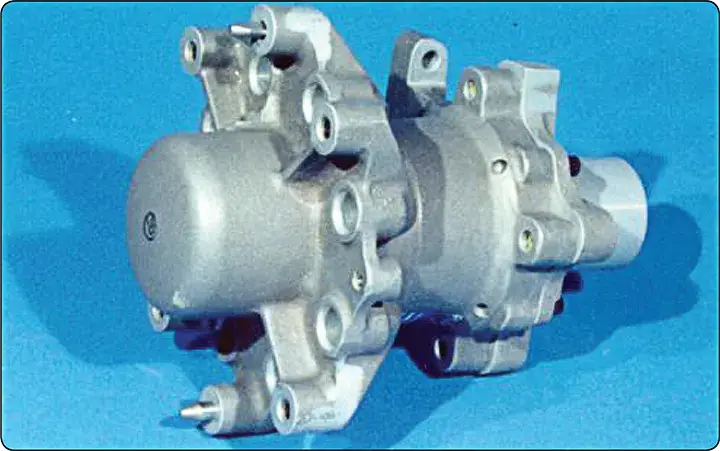 Fuel distribution valve used to control and route fuel flow within a gas turbine engine fuel system