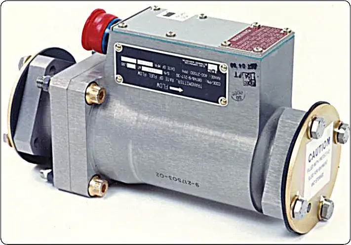 Fuel flow transmitter used to measure and provide fuel flow information in a gas turbine engine fuel system