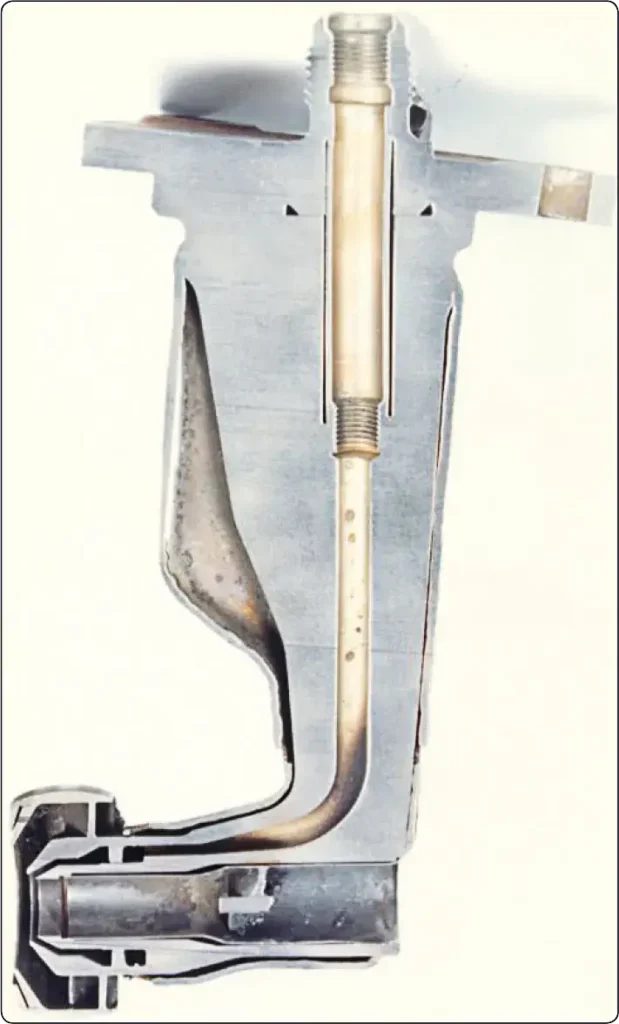 Cutaway view of a simplex airblast fuel nozzle showing its internal fuel and airflow passages