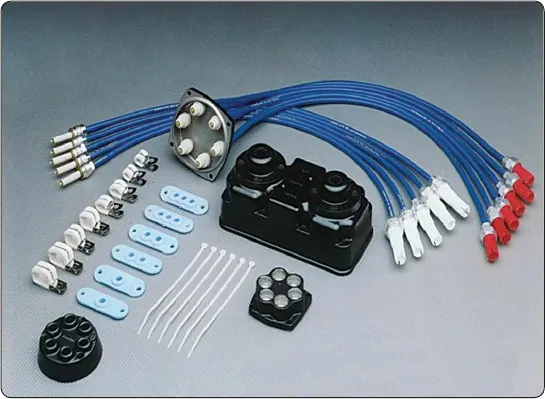 Aircraft engine high-tension ignition harness showing the insulated leads that carry high-voltage current from the magneto distributor to the spark plugs