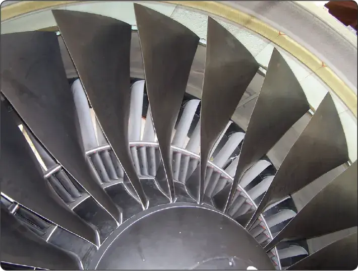 Diagram showing fan airflow passing through the fan blades and exit guide vanes of a turbofan engine