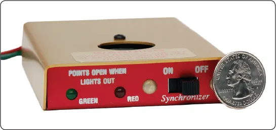 Aircraft engine ignition timing light used to indicate the instant the magneto points open during timing adjustment