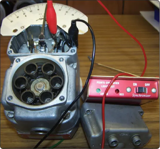Illustration showing a timing kit being installed on an aircraft magneto to check and adjust ignition timing