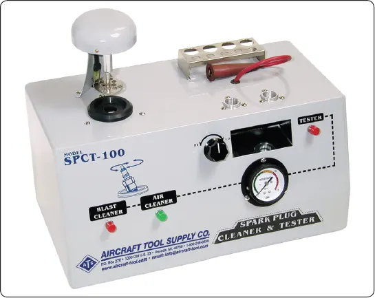 Aircraft spark plug cleaning and testing equipment used to remove deposits and check spark plug operation during maintenance