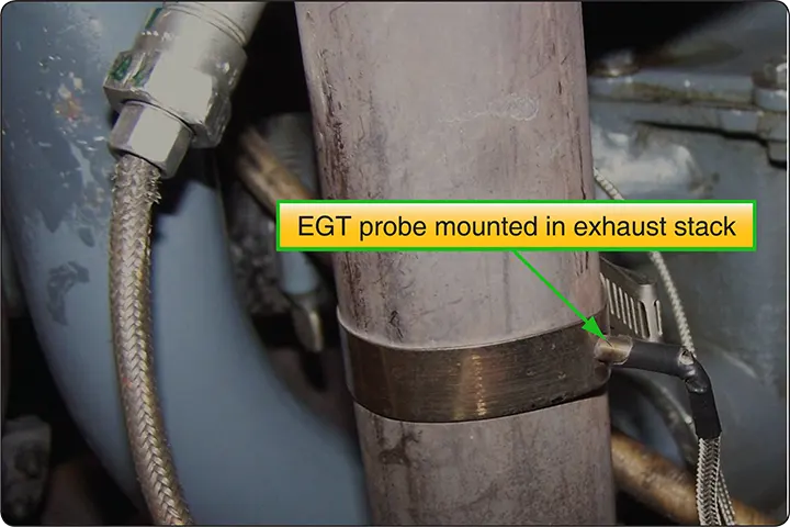 Exhaust gas temperature (EGT) probe installed in an aircraft engine exhaust stack to measure exhaust gas temperature during operation