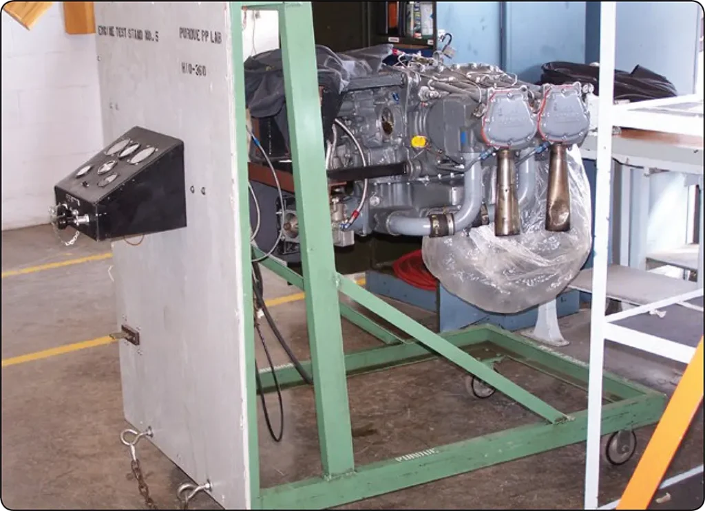 Engine test stand designed to secure an aircraft reciprocating engine during ground testing and performance evaluation