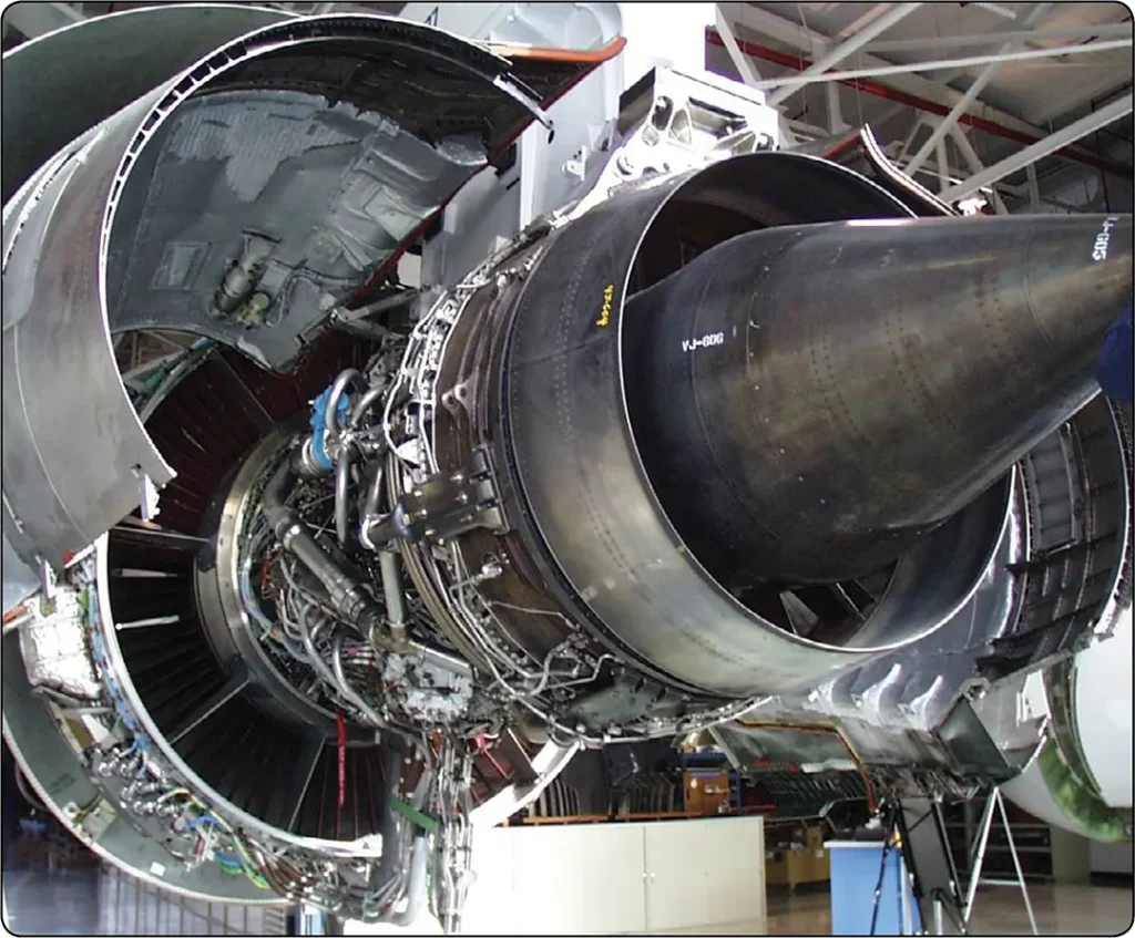 Open cowling view of a typical aircraft engine power package, showing the engine and surrounding components before removal or installation